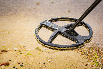 metal detector on sea beach