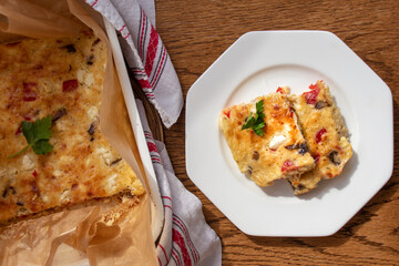 Homemade quark or curd casserole with mushrooms, red bell pepper and cheese. Healthy food,...