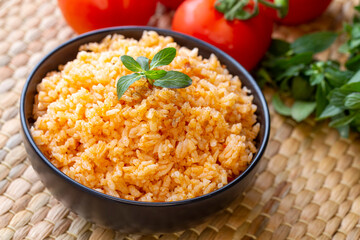 Traditional delicious Turkish food; rice pilaf with tomatoes (Turkish name; Domatesli pirinc pilavi)