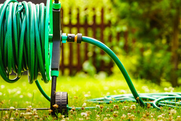 Garden hose for watering plants in garden