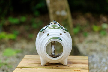 豚の形をした蚊取り線香の入れ物　夏のイメージ　Pig-shaped mosquito coil...