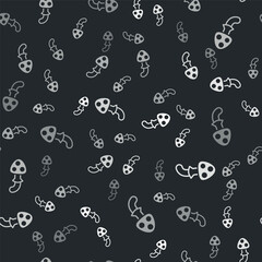 Grey Psilocybin mushroom icon isolated seamless pattern on black background. Psychedelic hallucination. Vector