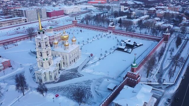 Scenic view from drone of snow covered Tula Kremlin and Holy Assumption Cathedral on background with cityscape, Russia