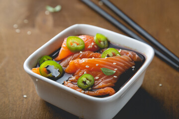 Pickled pieces of salmon on the table