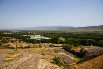 Fototapeta premium View from high on the river and sandy mountains of Georgia.