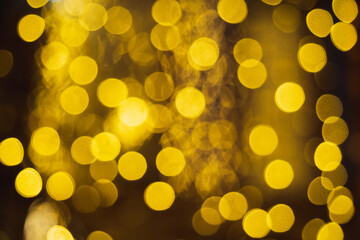 Obraz premium Golden glow bokeh light and shine with black background