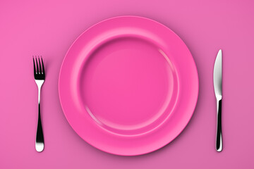 An empty pink plate on a pink table and a fork with a knife. Top view
