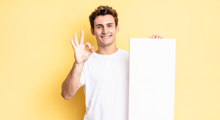 smiling and looking friendly, showing number three or third with hand forward, counting down. empty...