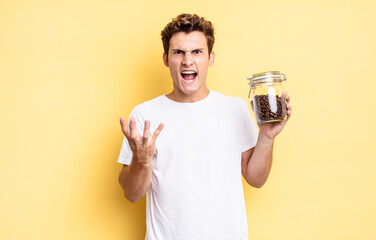 looking angry, annoyed and frustrated screaming wtf or what’s wrong with you. coffee beans concept