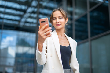 Business woman using a smartphone