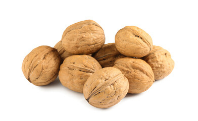 Whole walnuts in shell on white background