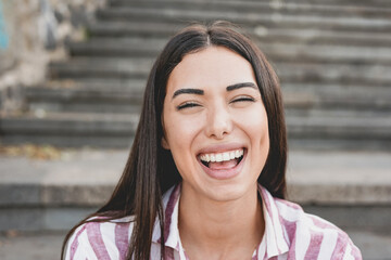 Young latin woman laughing on camera - Concept of happiness