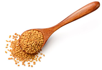 fenugreek seeds in the wooden spoon, isolated on the white background, top view