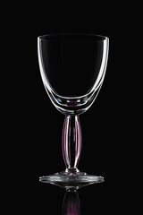 Wine glass on a black background.