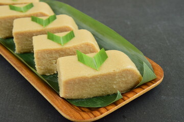 Singkong Agar Agar Kukus. Cassava steamed cake with pandan leaf
