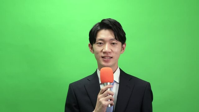 アナウンサー　クロマキー合成用　グリーンバック
