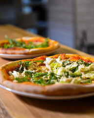 Delicious Italian pizza served on wooden table, traditional recipe.
