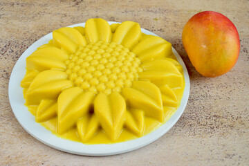 Mango coconut pudding with flower shape mould. 