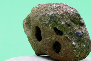close-up natural stone texture on green background