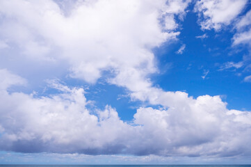 Fototapeta premium Blue sky with white clouds over tropical sea Nature composition beautiful clouds background