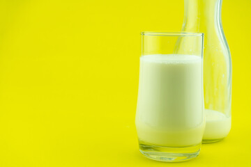 Banner of a glass of milk on colorful background Milk day Copy space