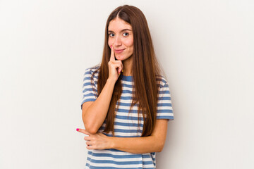 Young caucasian woman isolated on white background looking sideways with doubtful and skeptical expression.