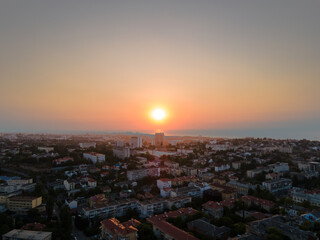 Fototapeta na wymiar panorama of a seaside town at sunset from the air. Black Sea.
