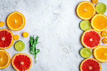 design with blood orange and lime on gray background top view mock-up