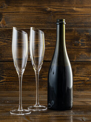 wine glasses with beveled edges on dark wooden background