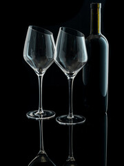 wine glasses with beveled edges on black background