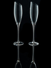 wine glasses with beveled edges on black background