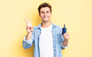 smiling and looking happy, carefree and positive, gesturing victory or peace with one hand....