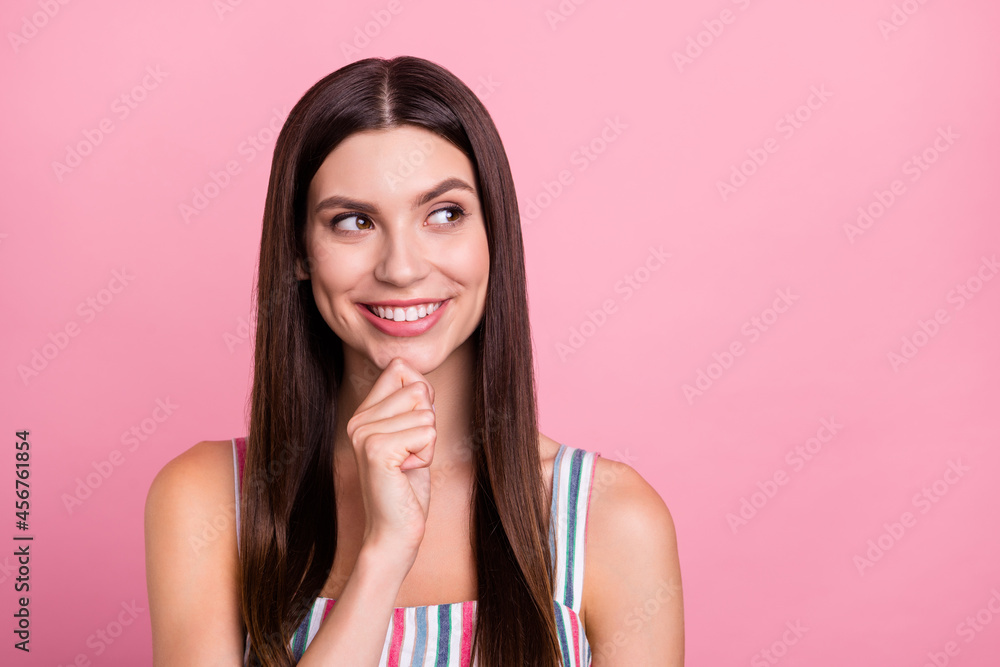 Sticker Portrait of attractive cheerful bewildered girl overthinking copy space isolated over pink pastel color background