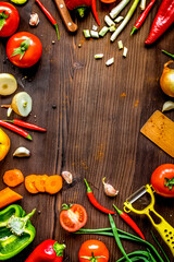 ingredients for vegetable ragout on wooden background top view