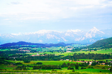 Fototapeta na wymiar Panorama landscape in the Allgäu in Bavaria. Nature with mountains, meadows and forests.