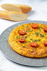 Typical Spanish tortilla in marble table