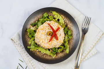 Russian salad in marble table

