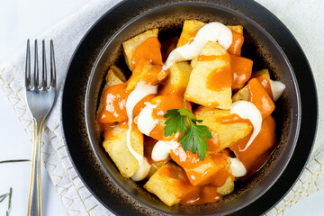 Spicy Potatoes in marble table