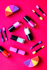 Obraz premium make up set on red background top view
