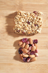 Healthy baking cookies. Oatmeal and honey sweets. Cranberry and nuts energy. Natural raw snack. Tasty cuisine. Vegerarian food. Delicious banana and flake granola