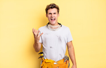 looking angry, annoyed and frustrated screaming wtf or what’s wrong with you. handyman concept