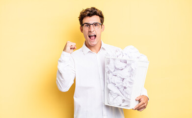 shouting aggressively with an angry expression or with fists clenched celebrating success. trash...
