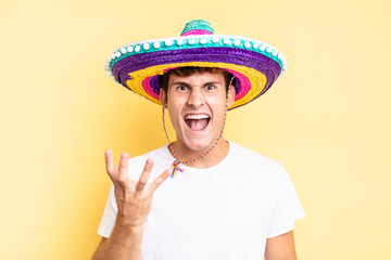 looking angry, annoyed and frustrated screaming wtf or what’s wrong with you. mexican hat concept