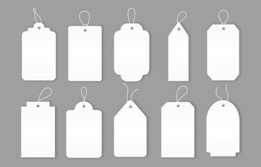 Blank white price tags that attached to clothing. Various background options. Graphic elements for websites and page. Realistic icons and badges. Flat vector illustration isolated on grey backdrop