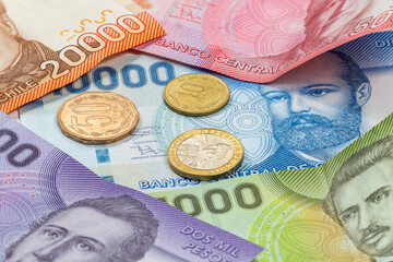 Coins and colorful bills of chilean peso