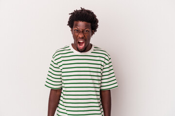 Fototapeta na wymiar Young african american man isolated on white background shouting very angry, rage concept, frustrated.