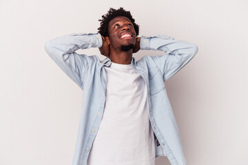 Young african american man isolated on white background  feeling confident, with hands behind the head.