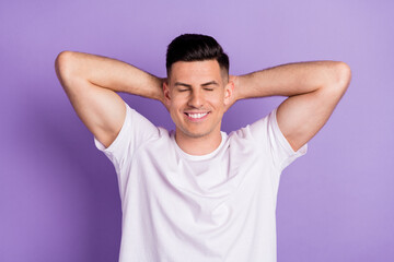 Top above high angle view photo of young man happy smile hands behind head dream sleep relax isolated over purple color background