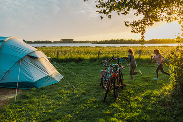 Children playing on the campsite 
