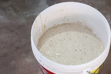 Fototapeta premium white colored plastic paint on pot